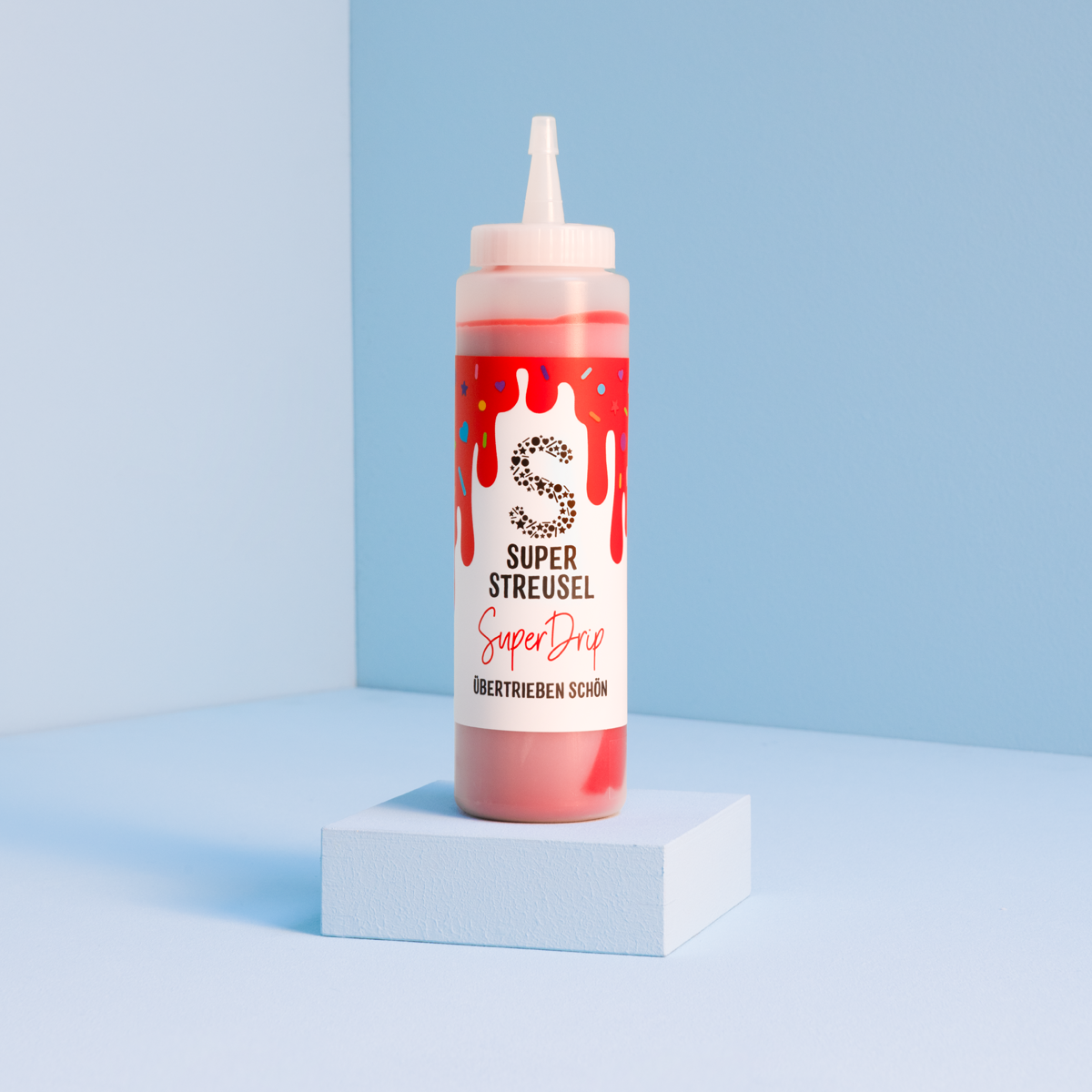 super-streusel-superdrip-rot-kuchenglasur-in-der-flasche-mit-vanille-schoko image 1