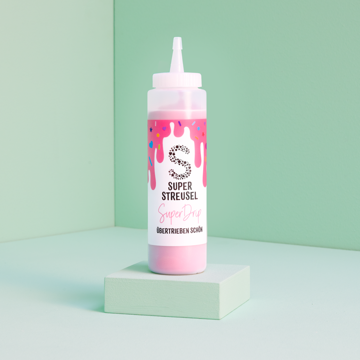 super-streusel-superdrip-rosa-kuchenglasur-in-der-flasche-mit-vanille-schoko-ges image 1