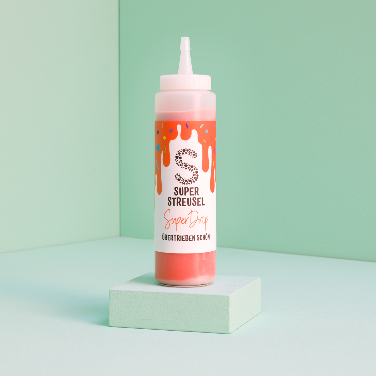 super-streusel-superdrip-orange-kuchenglasur-in-der-flasche-mit-vanille-schoko-g image 1