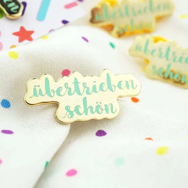 super-streusel-bertriebensch-n-emaille-pin image 1