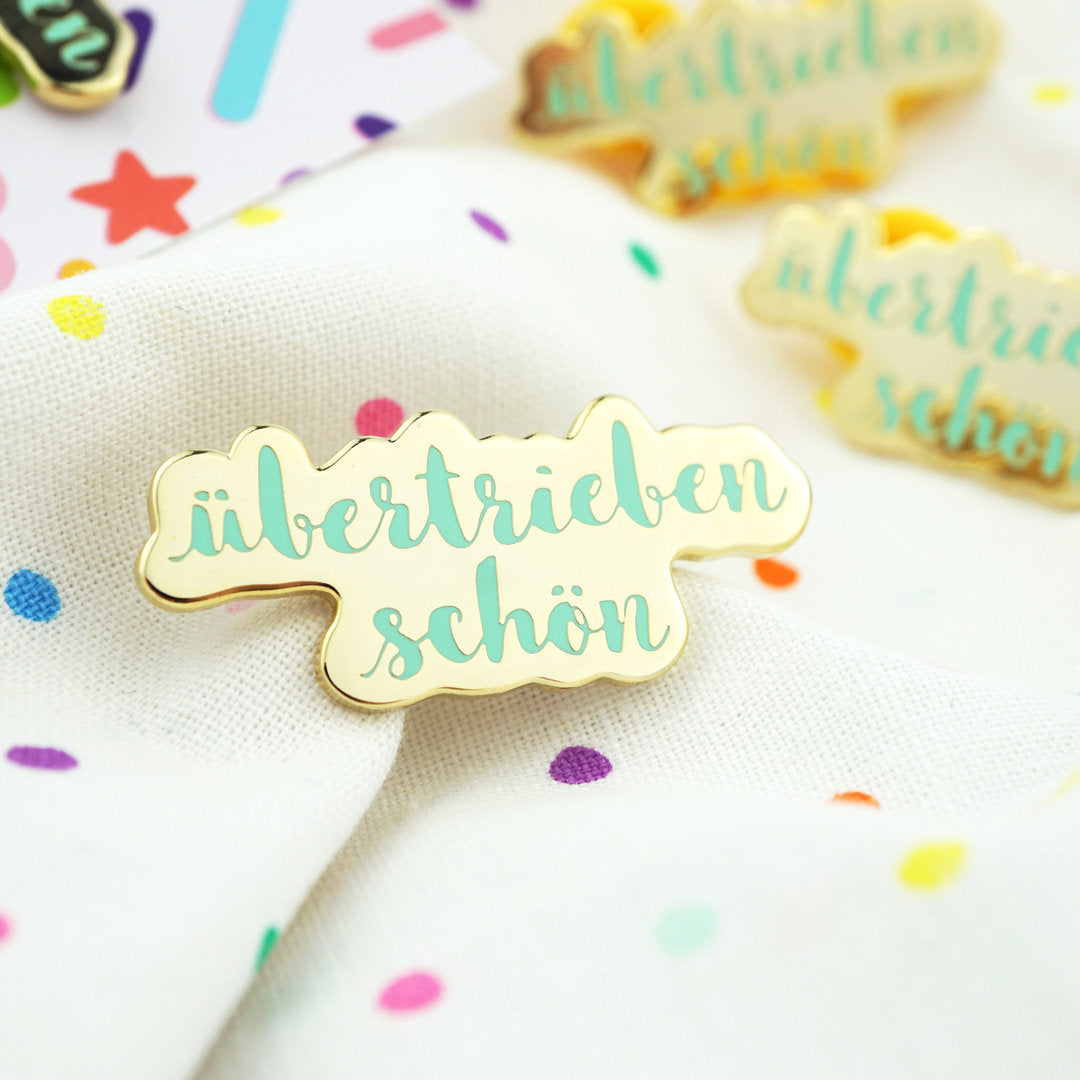 super-streusel-bertriebensch-n-emaille-pin image 1